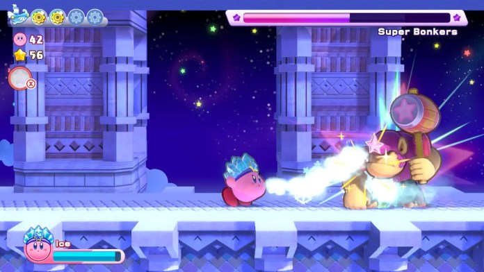 Kirby attaque un boss Super Bonkers avec la capacité Ice Copy