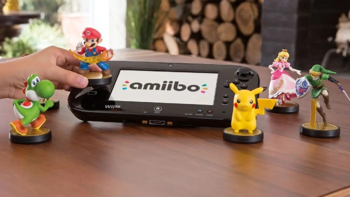 Manette de jeu Wii U avec Yoshi, Mario, Pikachu, Princess Peach et Link Amiibos